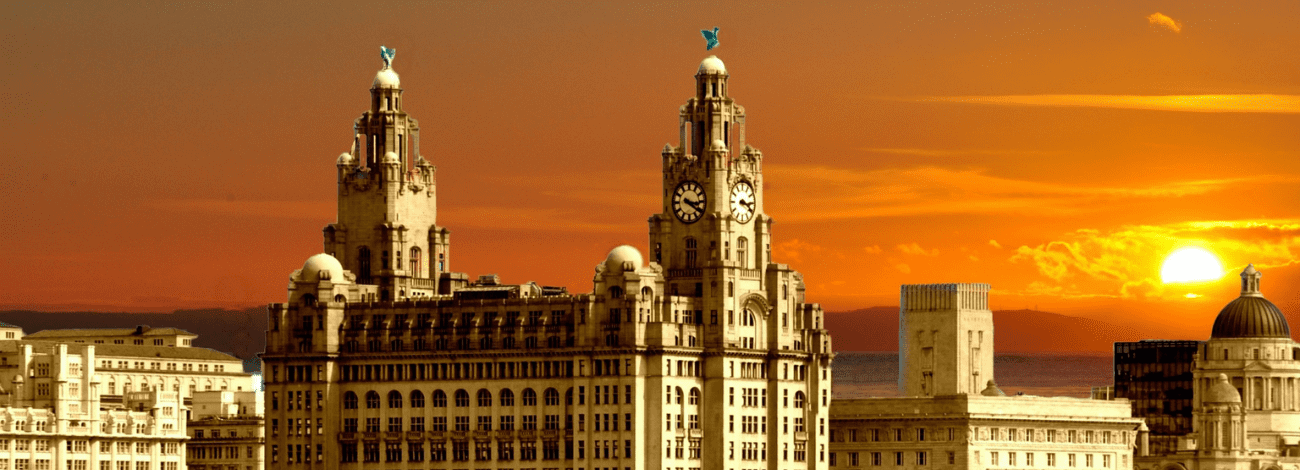 The Three Graces buildings of Liverpool with an incredible Sunny sky in the backdrop