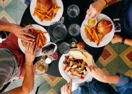 Featured image displaying friends dining out